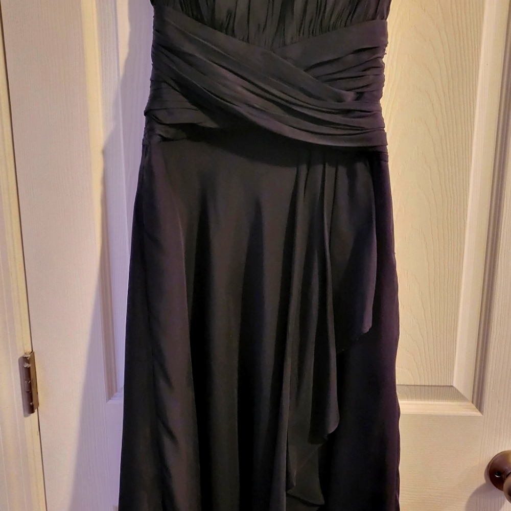 Sleeveless, black mini dress